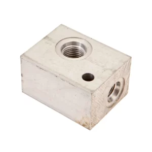 Oryginalna kostka łącząca akumulator ciśnieniowy napędu siekacza o wymiarach 30x40x52