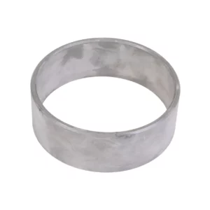 Tuleja metalowa zawieszenia przedniej osi o wymiarach 115 x 125 x 44 mm i oryginalnym numerze katalogowym 6000103312